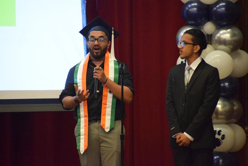 student speaking on stage